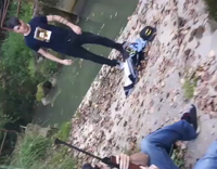 Guy Shoot Beer By River Shotguns It