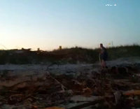 guy polevault over fire sticks