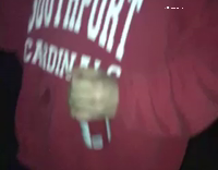 Guy opens and shotguns beer with deer head