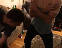 Folded Arms Guy Gets Nut Shotted In Living Room