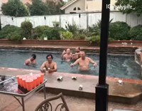 Guy pool bunch of dudes smashes beers