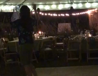 Long haired guy with glasses dancing 