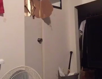 Grey Beenie Breaks Through Door and Bursts Into Room