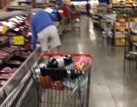 man with stain on shorts