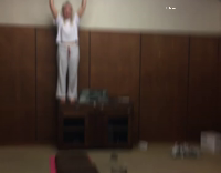 girl doing flip and lands on her back 