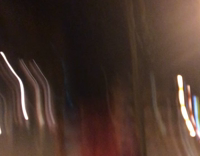 two guys play fighting and one guy gets dragged on the floor