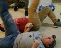 Two Dudes Leg Wrestle Apartment