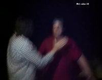 Big guy in red shirt choke slammed through table