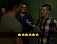 Green shirt asian guy punches plaid shirt guy