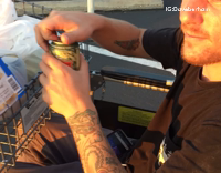 man wheelchair carrying beer