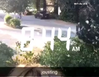 Two guys joust on a bike