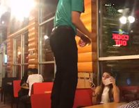 guy doing a backflip from a table and landing it 