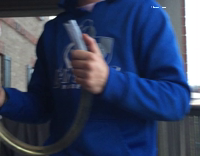 Red beer bong guy spills on head