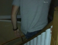 Guy Sliding Down Bannister Falls To Ground