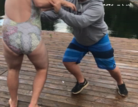 Two Guys Try To Push Friend Off Dock But He Falls Down