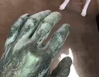 dog running away from zombie hand