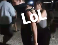 Woman climbs mans shoulders