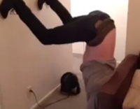 White guy twerks on wall