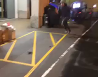 Man in Beenie Runs and Dives Head First Into Black Garbage Can