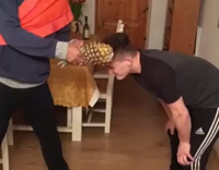Guy Hits Friend Across Head with a Pineapple