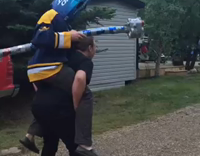 Jousting While Riding on Friends Back Using Beer Cans and Boxes as Armor