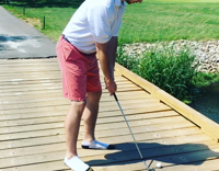 Red Shorts Guy Hits Golf Ball Off Wooden Bridge Drinks Been and Jumps Into Water