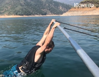 Guy Barefoot Skiing and His Shorts Fall Down