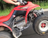 Shirtless Red Four Wheeler Wheelie Fail