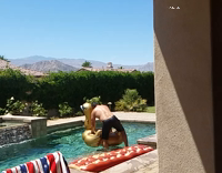 Guy tries to ride golden blowup swan