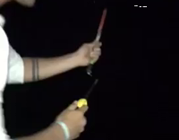 White Hat Holds Bottle Rocket Wrong Way