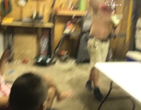 Red shirt cape guy jumps on table and breaks it