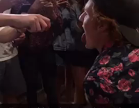 Guy black red flower shirt tongue tazer