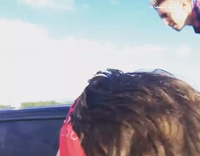 Guy cut off plaid shirt white table