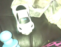 puppy barks at toy car