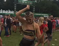Girl in camo clothes music festival dancing