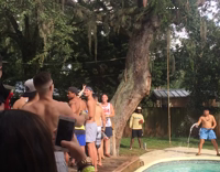 Guy Falls Out Of Tree and Falls Into Side of Pool