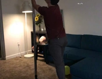 Living Room Strip Pole Breaks Into Glass Door