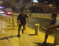 Guy in Brown Shorts and Blue Top Tries to Tackle Tree In Slow Motion