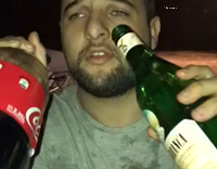 Drunk Man Drinks Coke and Whiskey From Separate Bottles