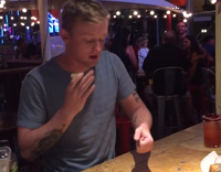 guy doing a shot up his nose