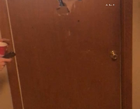 Guy runs through broken door happy birthday
