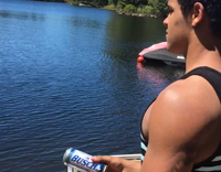 Long Distance Beer Throw to Guy in Neon Green Micro Bikini