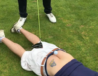Guy Hits Golf Ball From Tee in Friends Butt Crack Tatoo